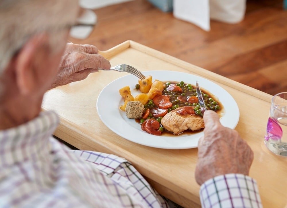 what causes a dementia patient to eat more